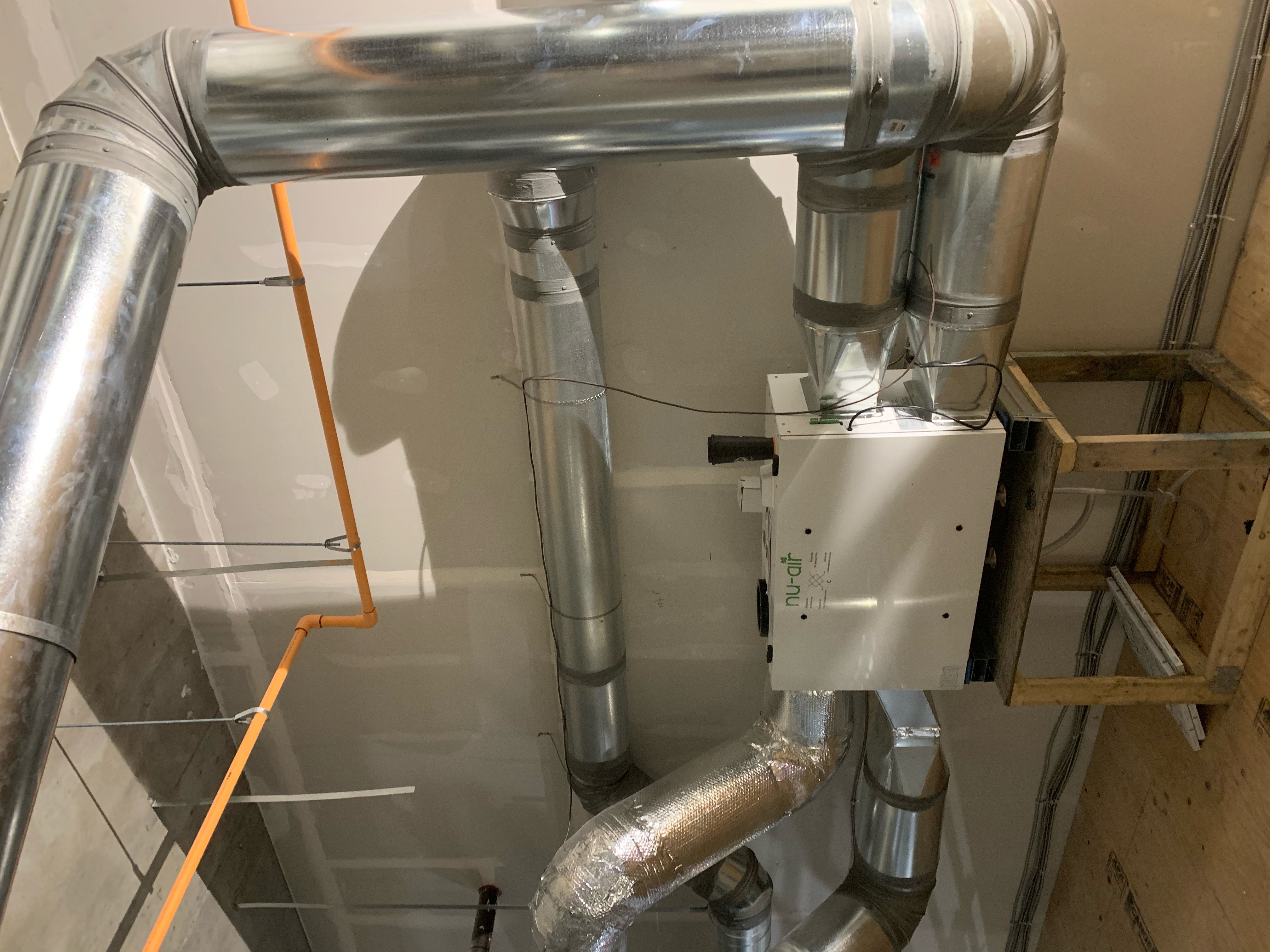 Nu-Air commercial ERV unit with large spiral ductwork